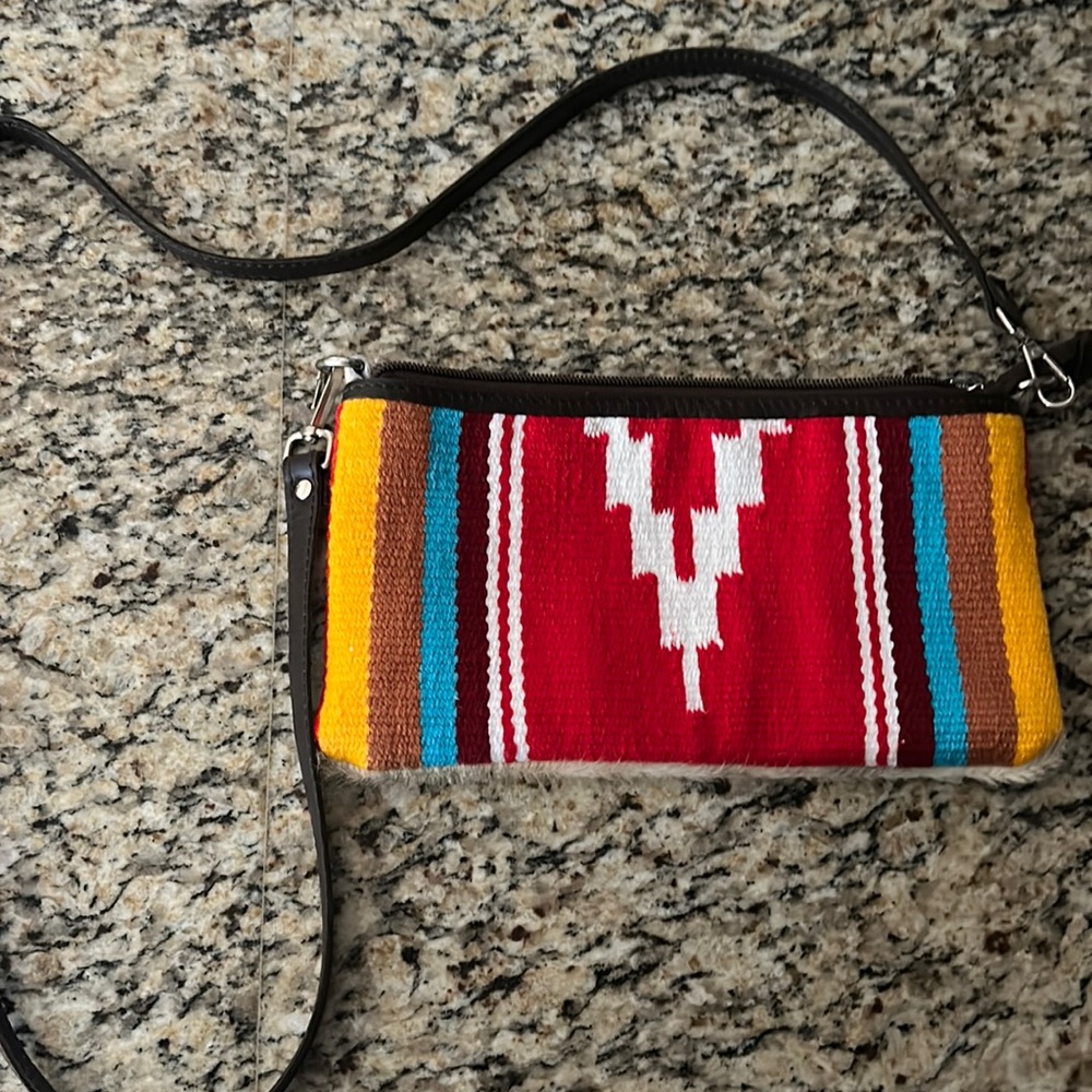 Cowhide and saddle purse